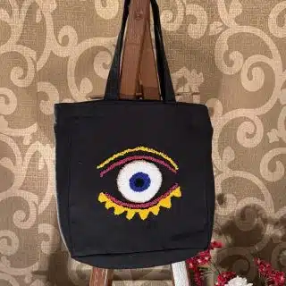 Colored evil eye box tote bag
