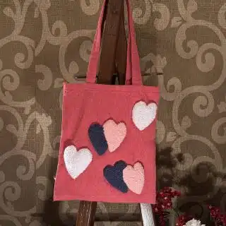 Scattered hearts pink tote bag