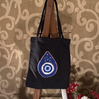 Evil eye tear shaped tote bag
