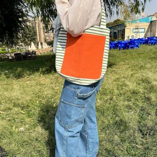 Striped green and white tote bag