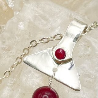 Handmade silver pendant with ruby beads