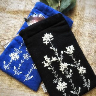 Black Mobile or sunglasses holder