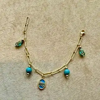 Gold plated bracelet with Horus-eye pendant