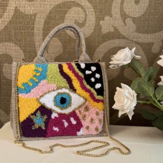 Colored tufted jute bag