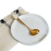 White soap ladle