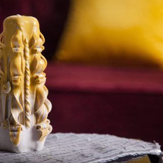 Mustard yellow carved candle