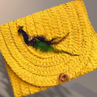 Peacock straw clutch