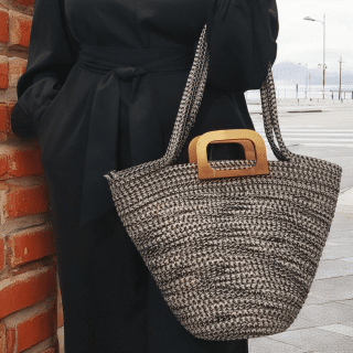 Black & beige bag with wooden hand