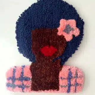 "FLOWER GIRL" tufted wall hanging