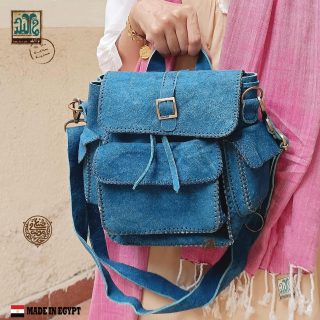 شنطة مربعة جلد بالجيوب .