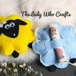 Edia holder sheep toy