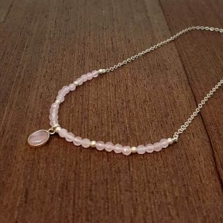 silver necklace with rose quartz stone