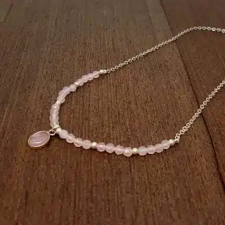 silver necklace with rose quartz stone
