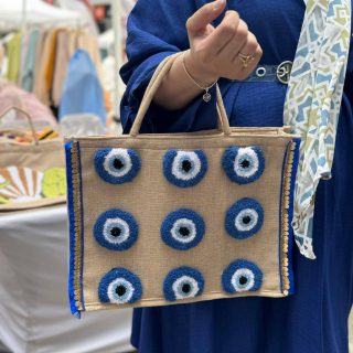 Blue evil eye jute bag