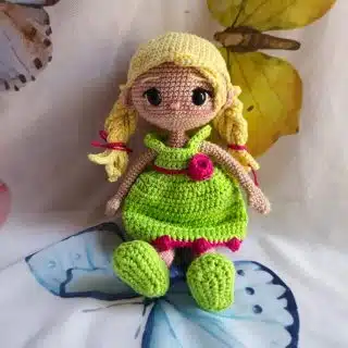 Doll with green dress