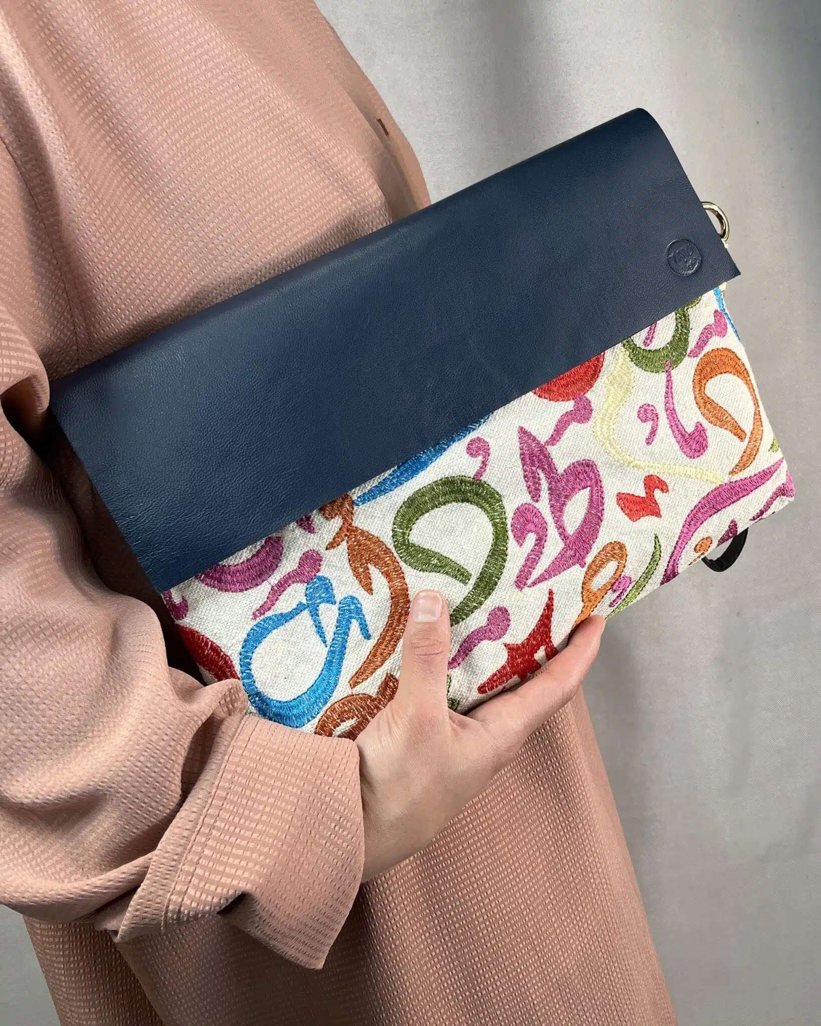 Genuine leather x Fabric Arabic Letters clutch 4 D7B7BBA0 32D9 469E 9C8B E65155DA12A3 scaled