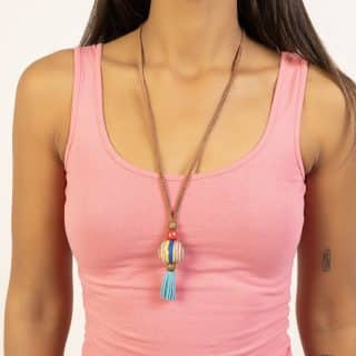 A Hand-Painted Bead With Tassel