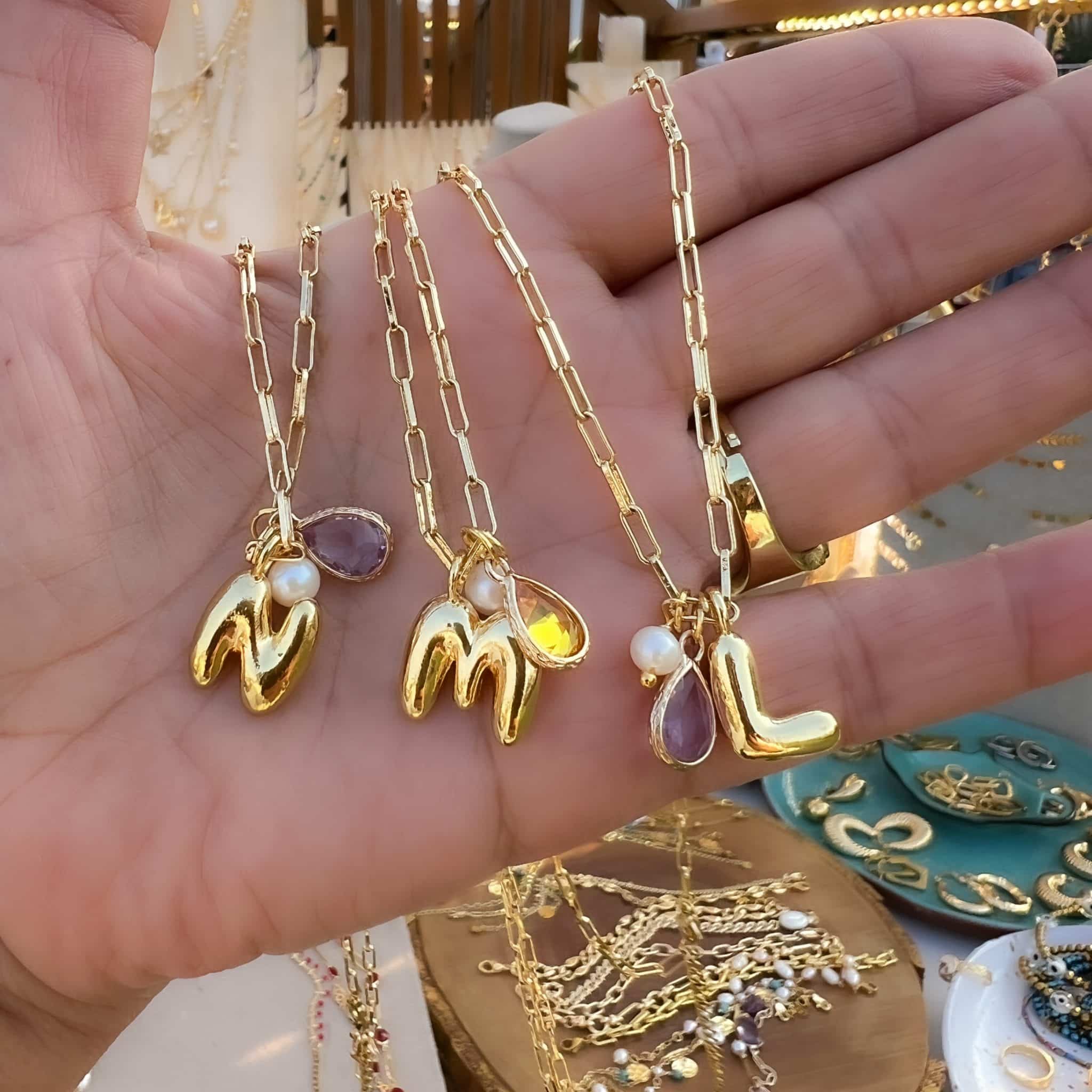 Curvy initials chains 2 7F35CD98 31FE 4356 A5C7 EFB8E75AEE0E scaled