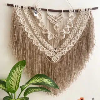 Large macrame wall hanging with tassels of jute