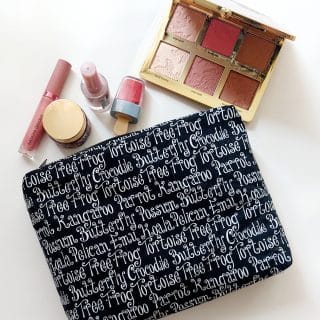 Fabric and faux leather makeup bag black with words
