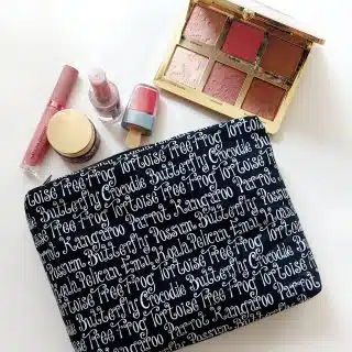 Fabric and faux leather makeup bag black with words