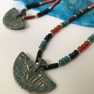 Multicolored stones necklace with pharaoh blue rust pendant