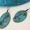 Asymmetrical bluerust earrings with hook