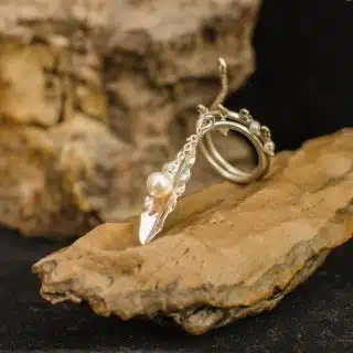 Embracing natue in 925 silver tendrils that wrap the finger in layers of light. Handcrafted. Exclusive. Whole sizes 5–9. 5/8" tapers to 1/4"w.