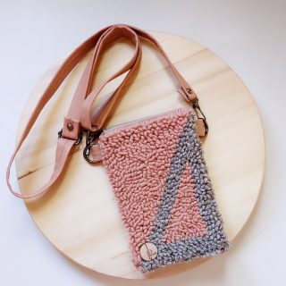 Pink faux leather punch needle crossbody bag
