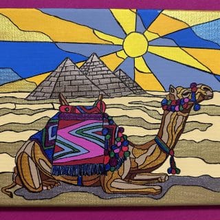 Camel at the pyramids