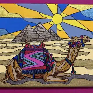 Camel at the pyramids