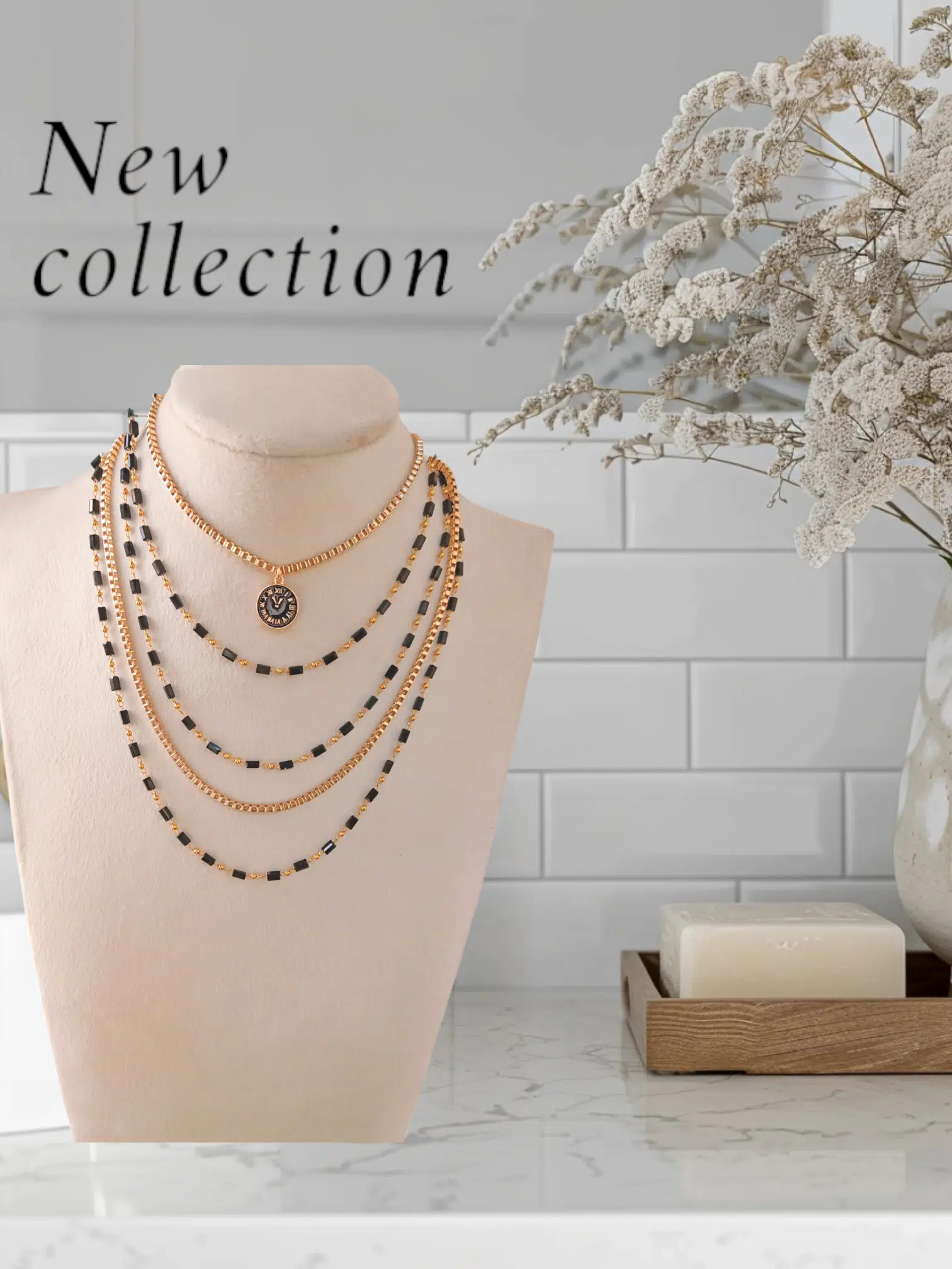 5-layered black necklace. 1 5-layered black necklace.