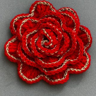 Red rose crochet brooch with golden borders