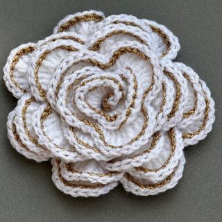 White rose crochet brooch with golden borders