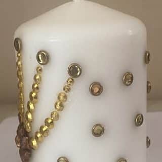 Unscented candle with decoration