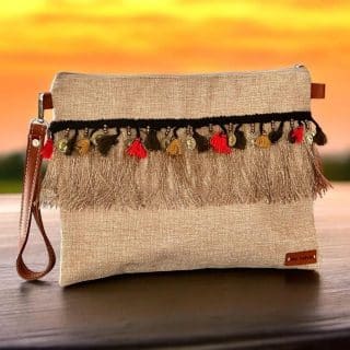 Beige clutch with multicolored fringes and coins