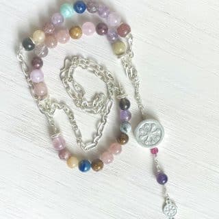 Silver circle unit with variety of gemstons beads necklace