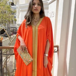 Orange kaftan with golden embroidery