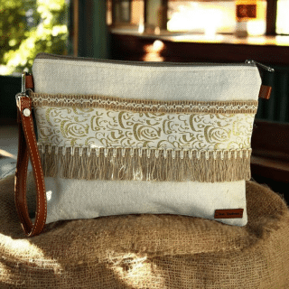 Beige clutch with arabic calligraphy and burlap fringes