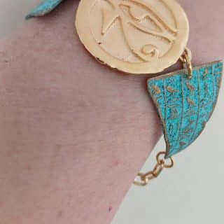 Gold Horus eye with blue rust sides cuff