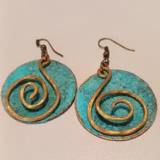 Bluerust circle earrings with brass spiral