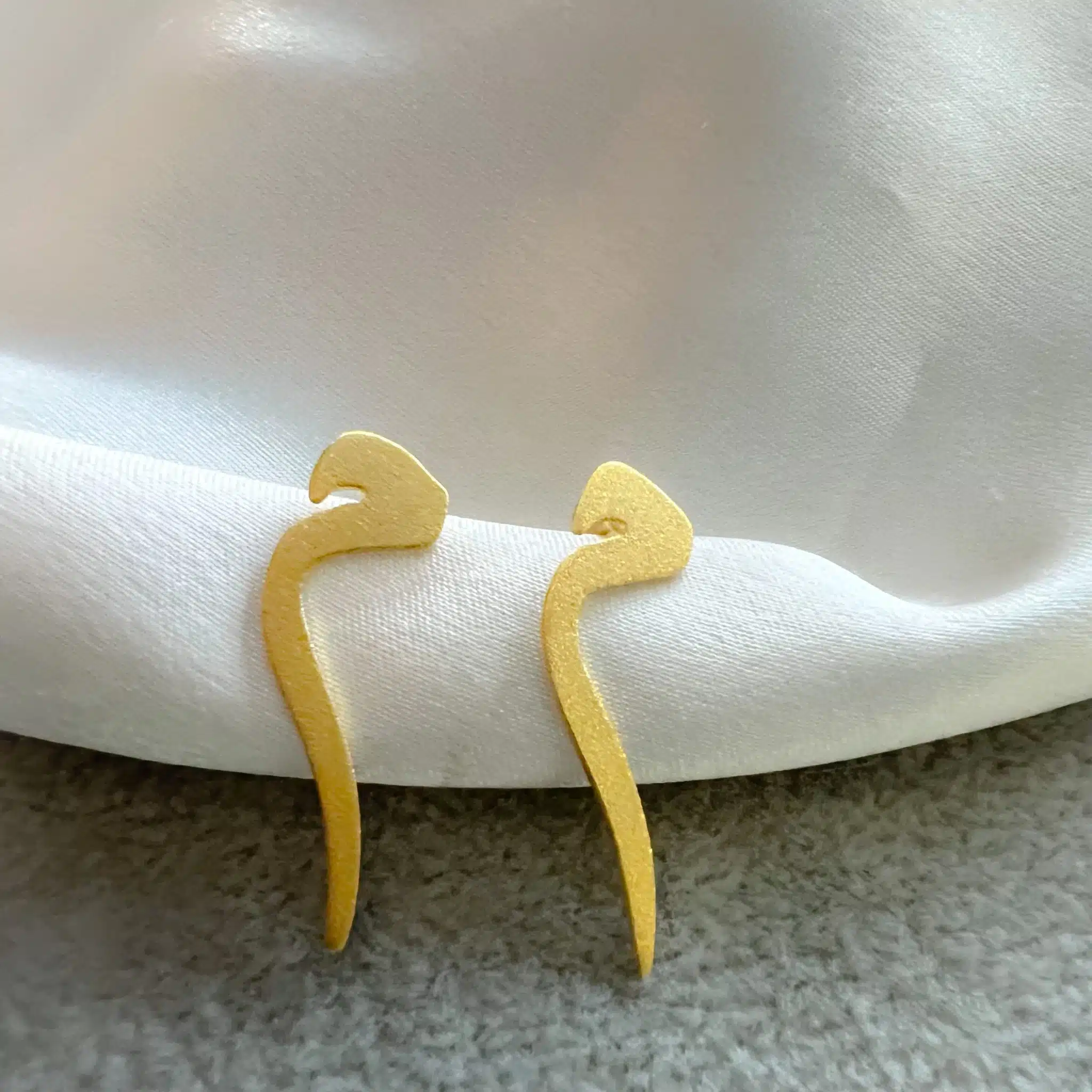 Arabic initial earring 5 7995911D 9CB0 4173 97EB ECF2F30CDA7D scaled