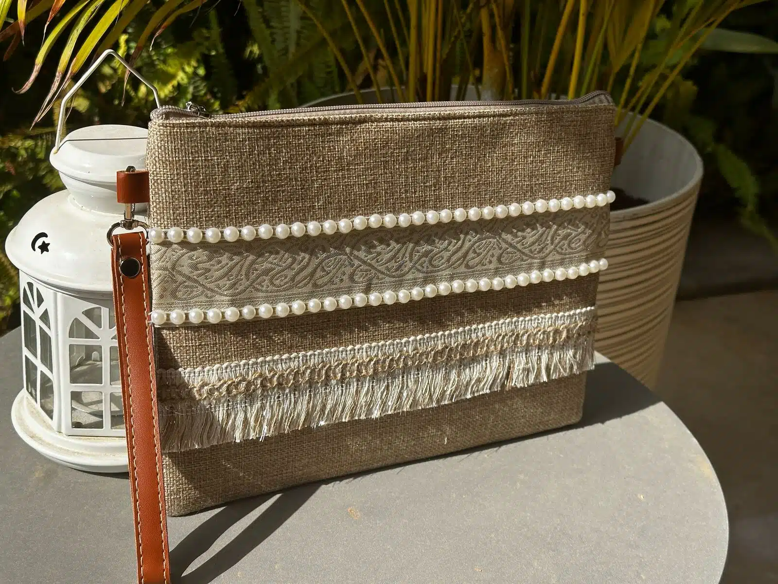 Beige clutch with pearly arabic calligraphy 2 IMG 20250308 WA0005