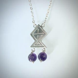 Silver fish necklace with Amathyst beads