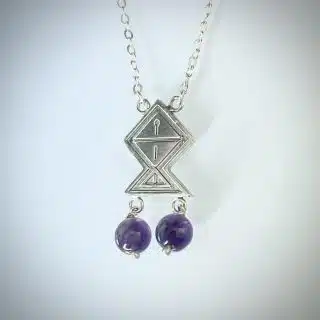 Silver fish necklace with Amathyst beads