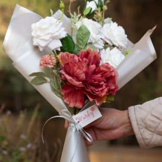 Elegant faux flowers gift.