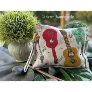 Nerm wristlet clutch