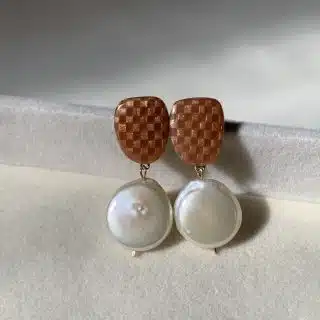 dara earrings in copper