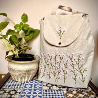 White flowery Backpack (bag)
