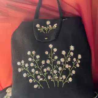 Black flowery Backpack (bag)